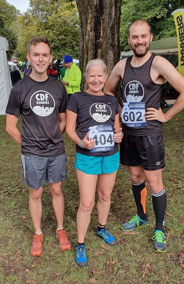 Sam, Debbie and Stewart standing in their running gear and trail shoes